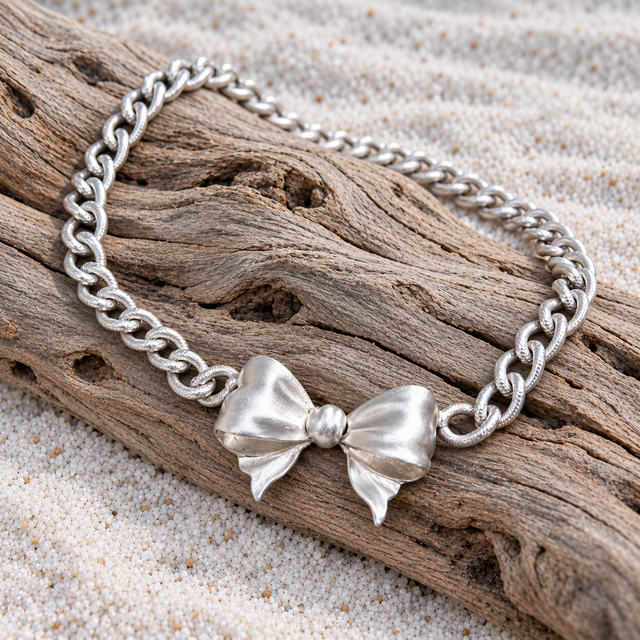 LARGE BOW NECKLACE