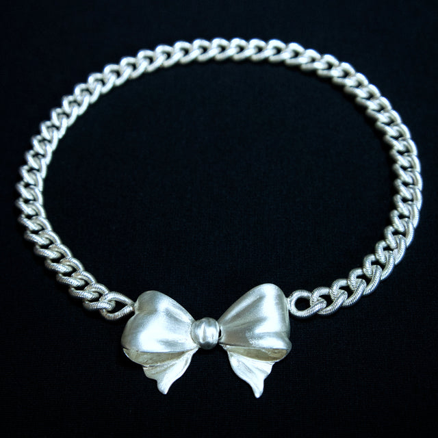 LARGE BOW NECKLACE