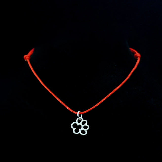 PAW PENDANT ON SILK